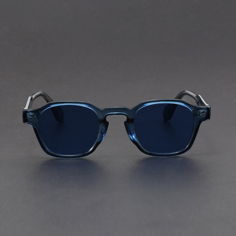 Distinctive square-shaped unisex sunglasses, embodying classic retro style and vintage eyewear fashion.