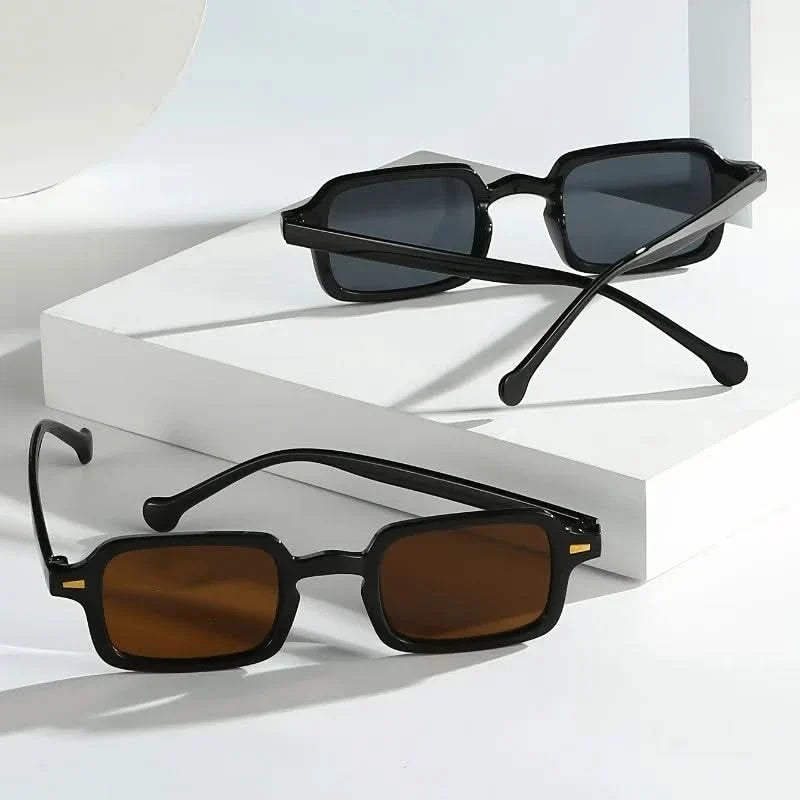 Black unisex retro square sunglasses with durable, anti-scratch lenses. Stylish and comfortable eyewear accessory.