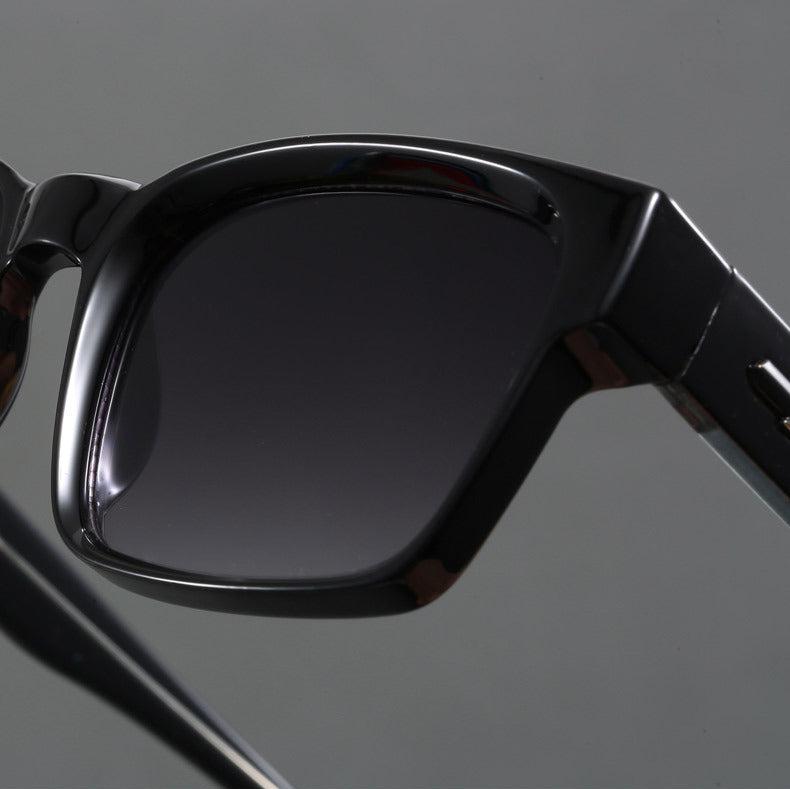 Lightweight unisex retro squared-frame sunglasses providing essential eye protection.