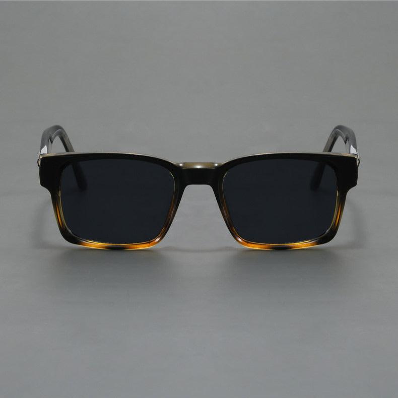Fashionable unisex retro squared-frame sunglasses with superior UV protection.