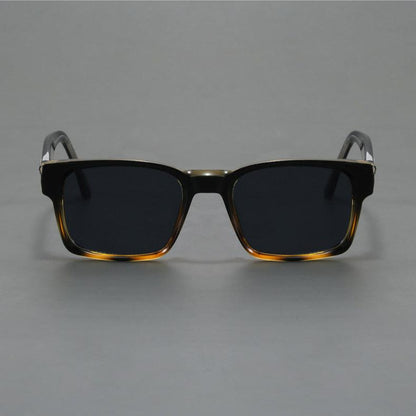 Fashionable unisex retro squared-frame sunglasses with superior UV protection.