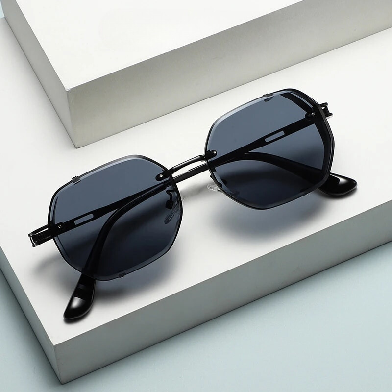 Retro steampunk sunglasses displayed with a protective case; a stylish and durable unisex accessory with UV block.