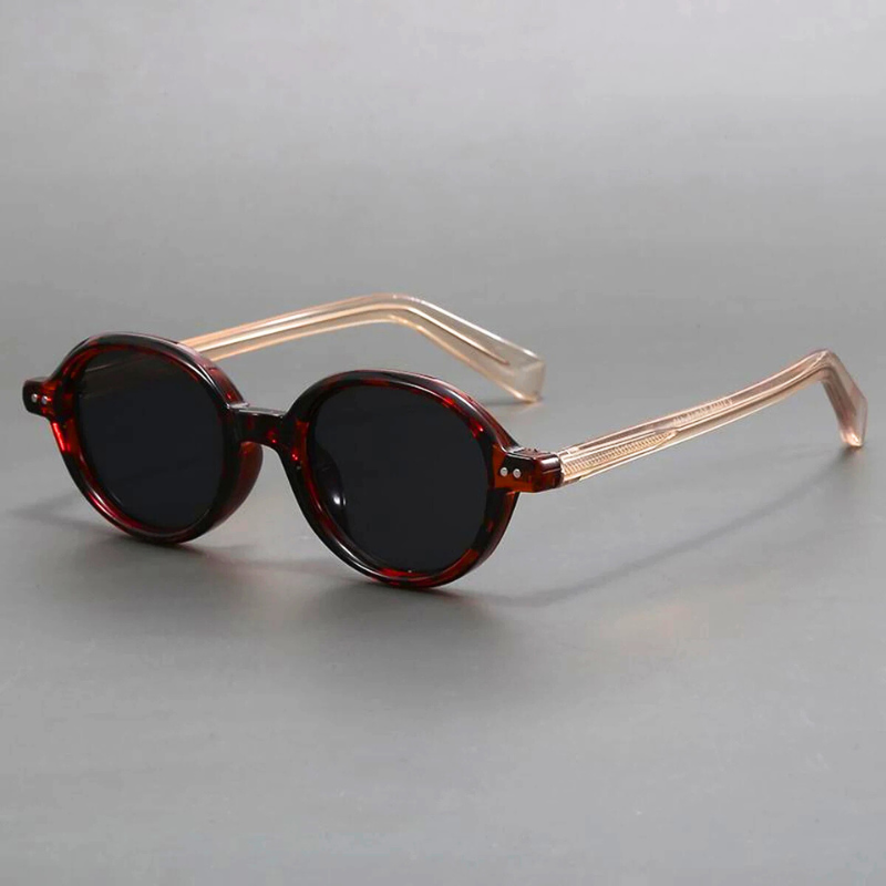 Fashionable unisex retro sunglasses with a classic design, providing stylish UV protection and anti-glare. Perfect accessory.