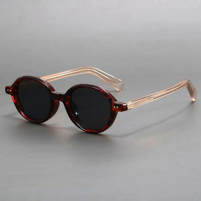 Fashionable unisex retro sunglasses with a classic design, providing stylish UV protection and anti-glare. Perfect accessory.