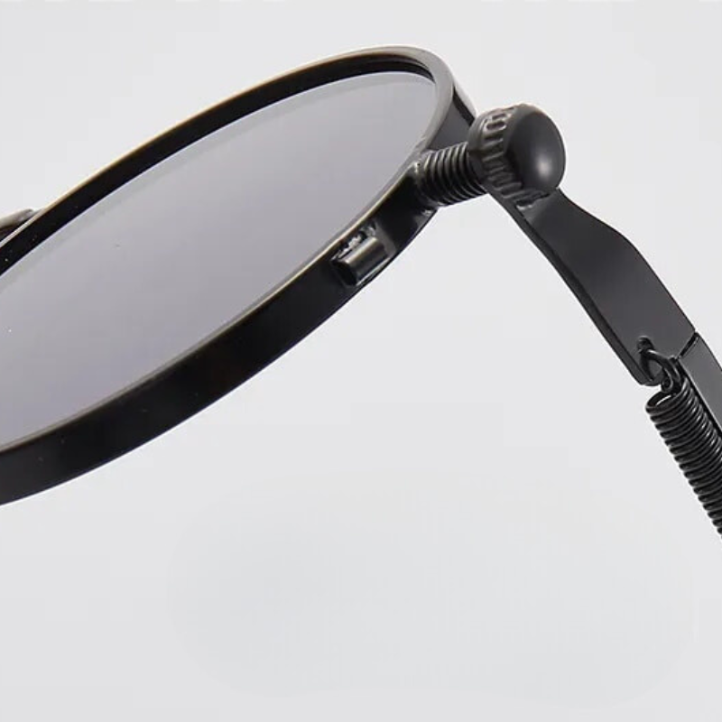 Sleek black Vintero shades. Unisex retro sunglasses for stylish eye protection and a timeless vintage look.