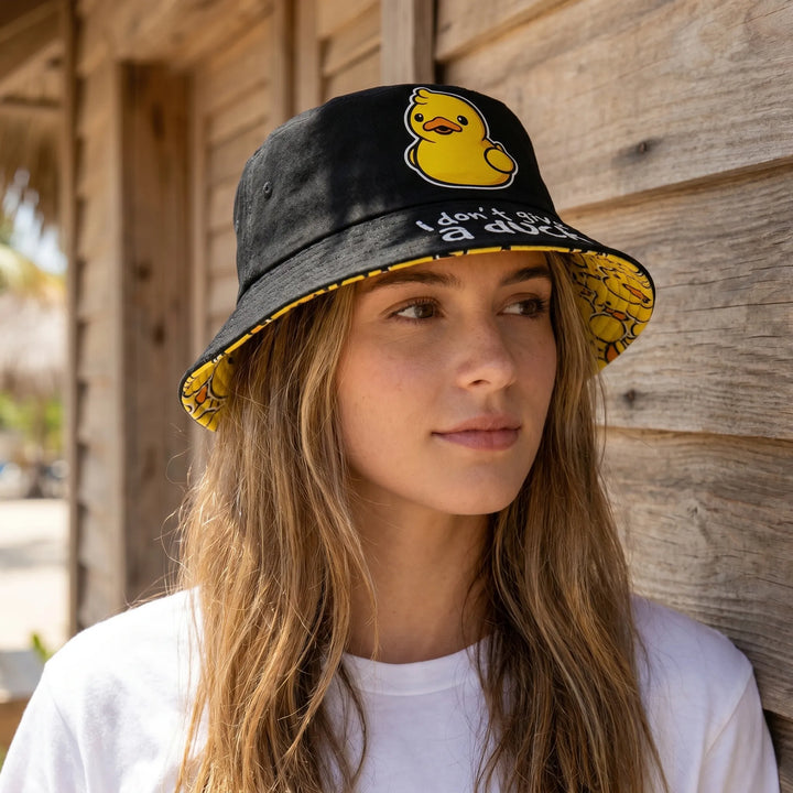 Unisex reversible bucket hat with playful cartoon bird print. Perfect for summer, beach, or casual travel. Trendy headwear.