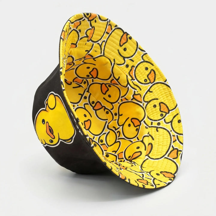 Playful cartoon bird reversible bucket hat for unisex adults. Ideal for summer, vacations, and adding a fun touch to outfits.