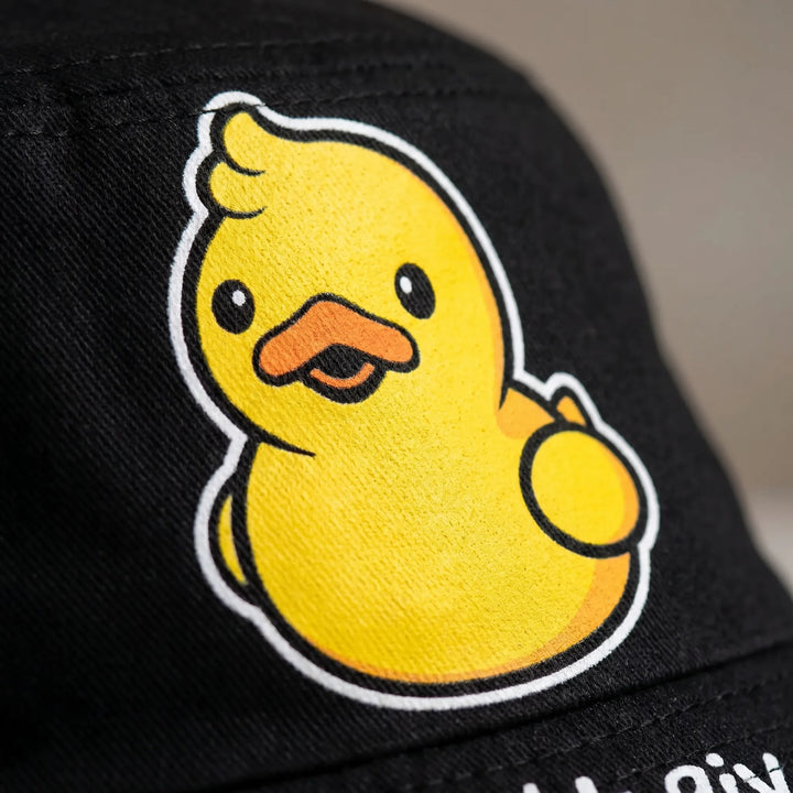 Reversible unisex bucket hat with cute cartoon bird design. Versatile for summer beach days, travel, and casual outdoor wear.