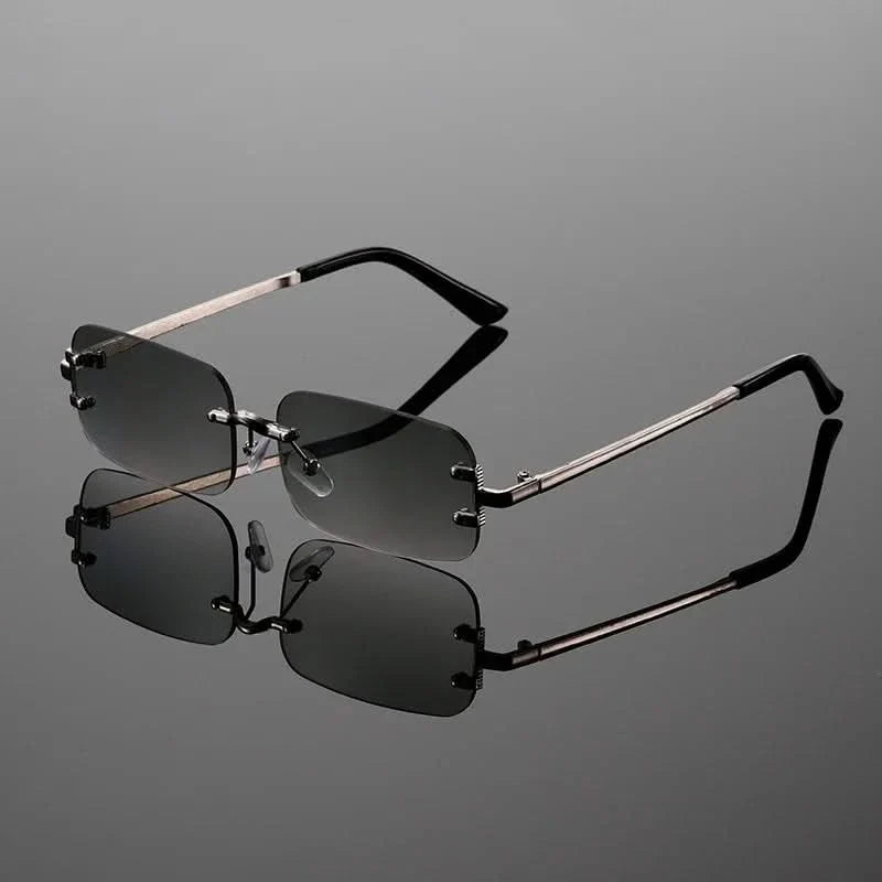 Unisex rimless anti-glare sunglasses with metallic frames for modern, stylish eye protection.