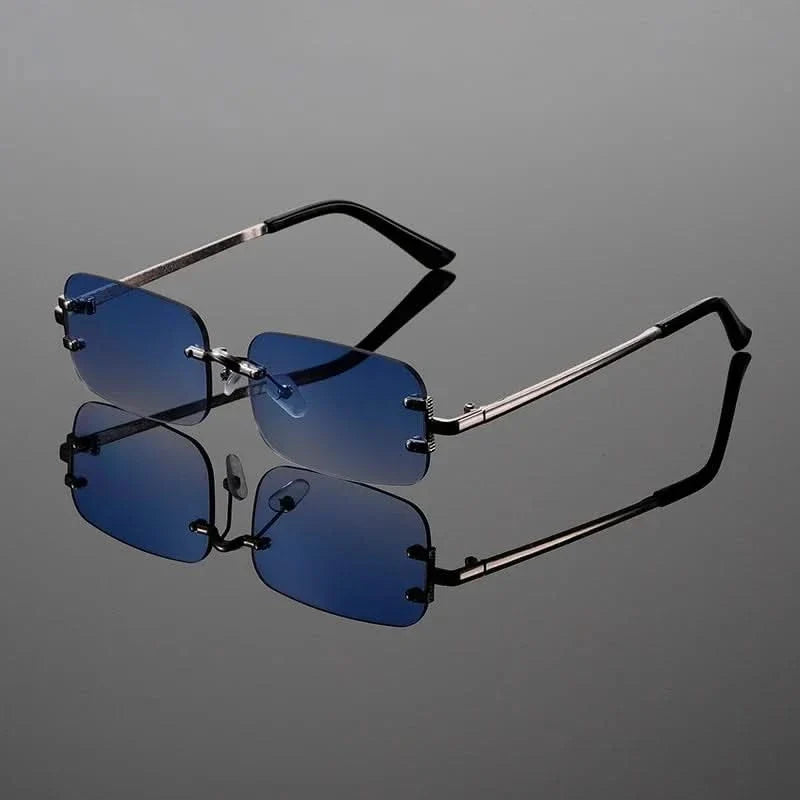 Stylish metallic rimless sunglasses, providing anti-glare protection for trendy unisex eyewear.
