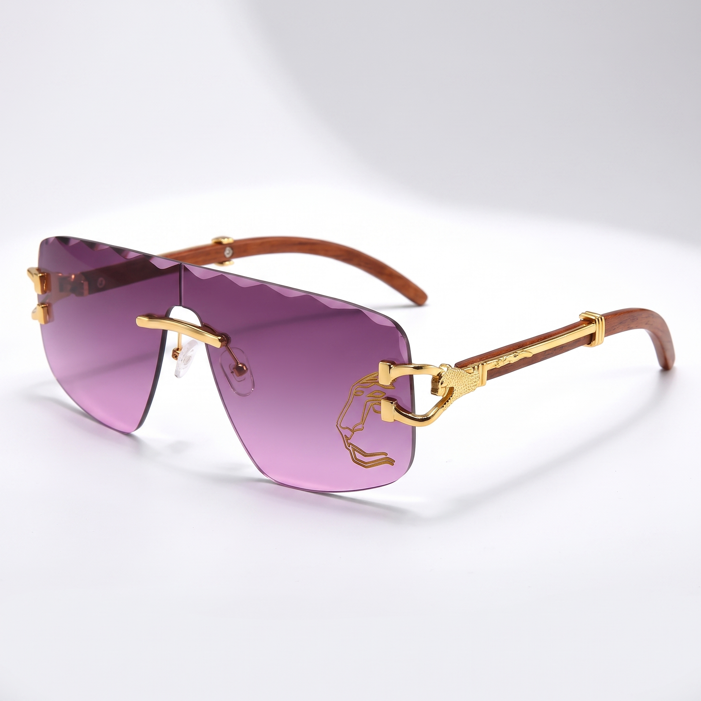 Modern pink rimless sunglasses, offering unisex UV protection & fashionable eye care.