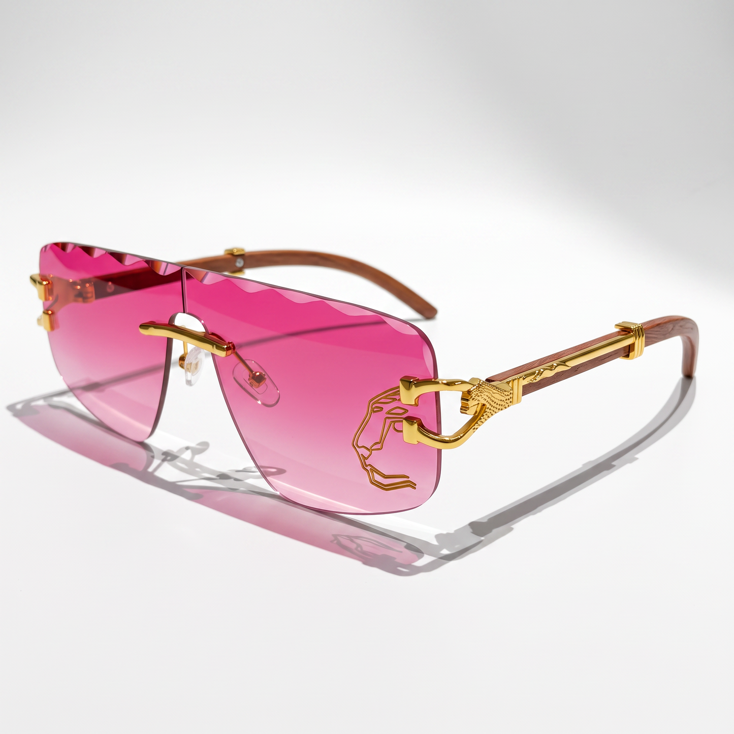 Sleek gray rimless sunglasses providing unisex UV protection; modern eye protection eyewear.