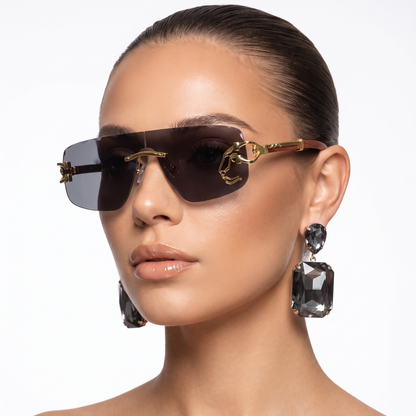Fashionable green rimless sunglasses with UV protection for unisex eye protection & style.