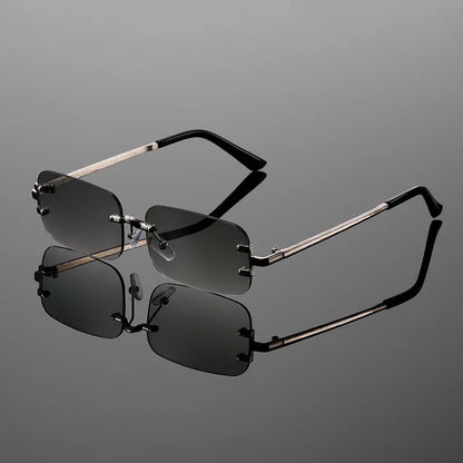 Unisex rimless rectangular sunglasses with sleek metal frame, offering anti-glare eye protection and modern style.