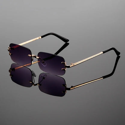 Detail of sleek rimless rectangular sunglasses. Unisex design with modern metal frame and anti-glare lenses.