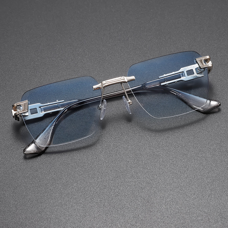 Comfortable, lightweight unisex rimless sunglasses with UV protection & an alloy frame, ideal for extended wear.