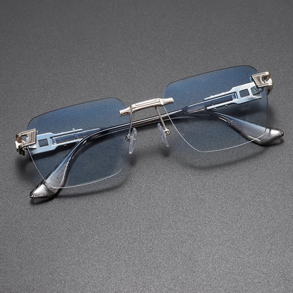 Comfortable, lightweight unisex rimless sunglasses with UV protection & an alloy frame, ideal for extended wear.