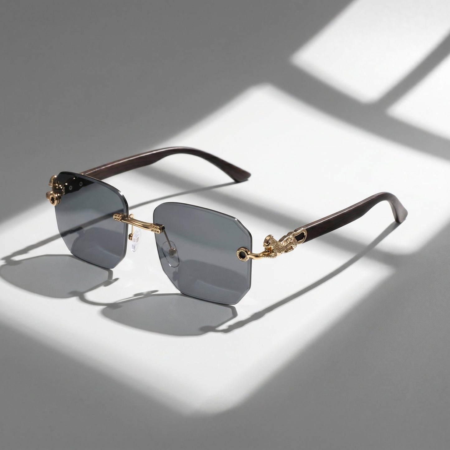 Elegant unisex rimless shades, featuring clear optics and high-level UV protection for any occasion.