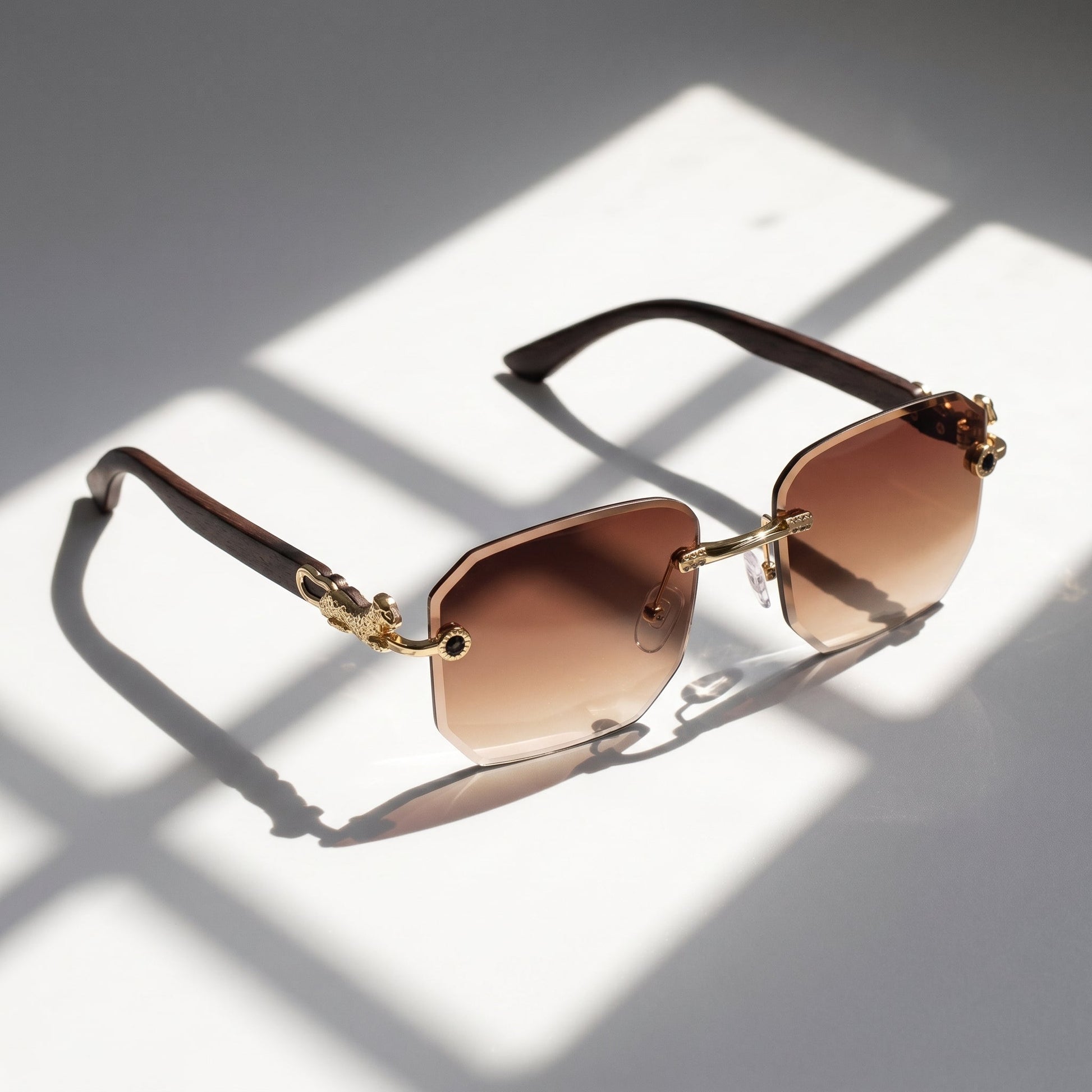 Close-up of unisex rimless UV protection sunglasses, showcasing their modern design and quality.