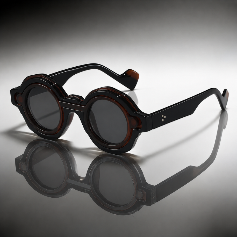Iconic round Riviera sunglasses, combining vintage appeal with modern UV protection for a cool look.