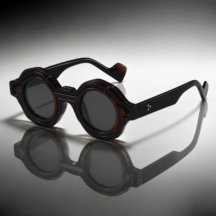 Iconic round Riviera sunglasses, combining vintage appeal with modern UV protection for a cool look.
