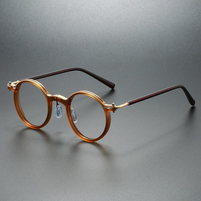 Premium unisex rounded acetate frames for reading. Durable, lightweight optical glasses ensuring crystal-clear vision.