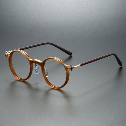 Premium unisex rounded acetate frames for reading. Durable, lightweight optical glasses ensuring crystal-clear vision.