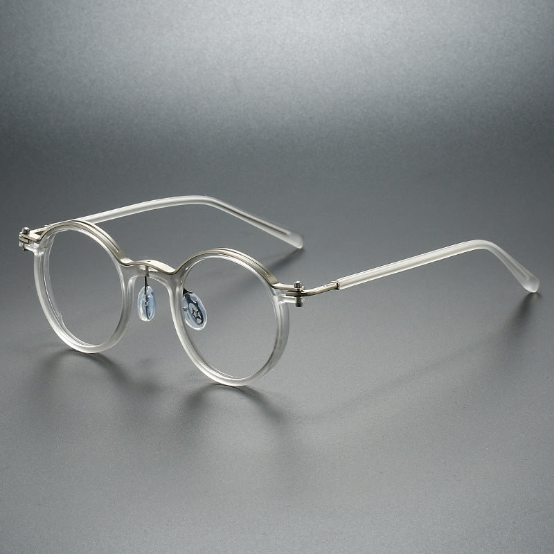 Close-up of modern unisex rounded acetate reading glasses. Clear vision & eye comfort for everyday use.