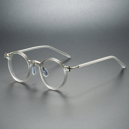 Close-up of modern unisex rounded acetate reading glasses. Clear vision & eye comfort for everyday use.