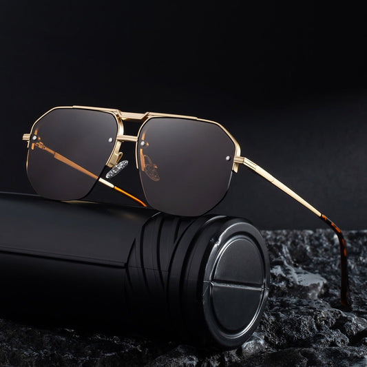 Unisex sculpted frame sunglasses, offering full UV400 protection. Modern minimalist eyewear for all.