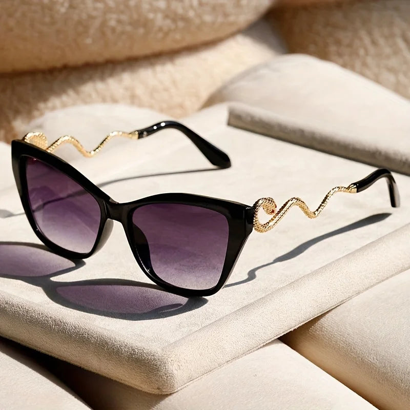 Statement Serpentina sunglasses offering UV protection. Fashion-forward unisex accessory for summer.