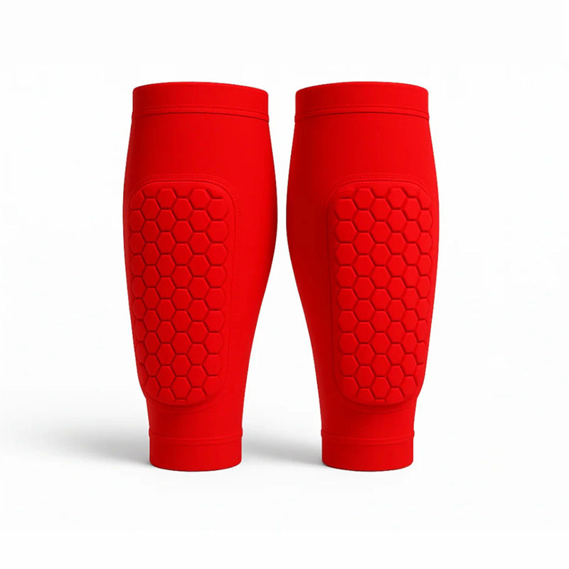 Durable unisex athletic gear: shin guards designed for skiing and soccer leg protection.