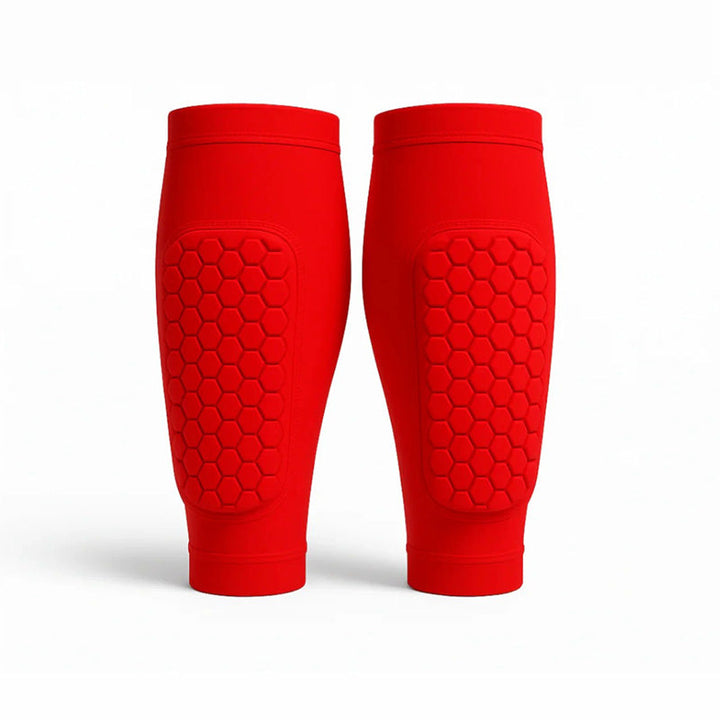 Durable unisex athletic gear: shin guards designed for skiing and soccer leg protection.