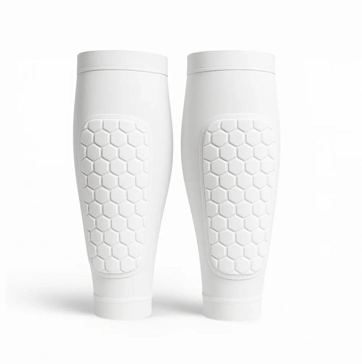 Versatile unisex shin protectors offering superior leg support for both skiing and soccer players.