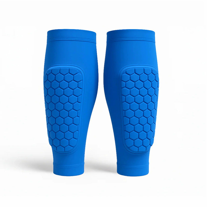 Close-up of black unisex shin guards showing ergonomic design for skiing and soccer protection.