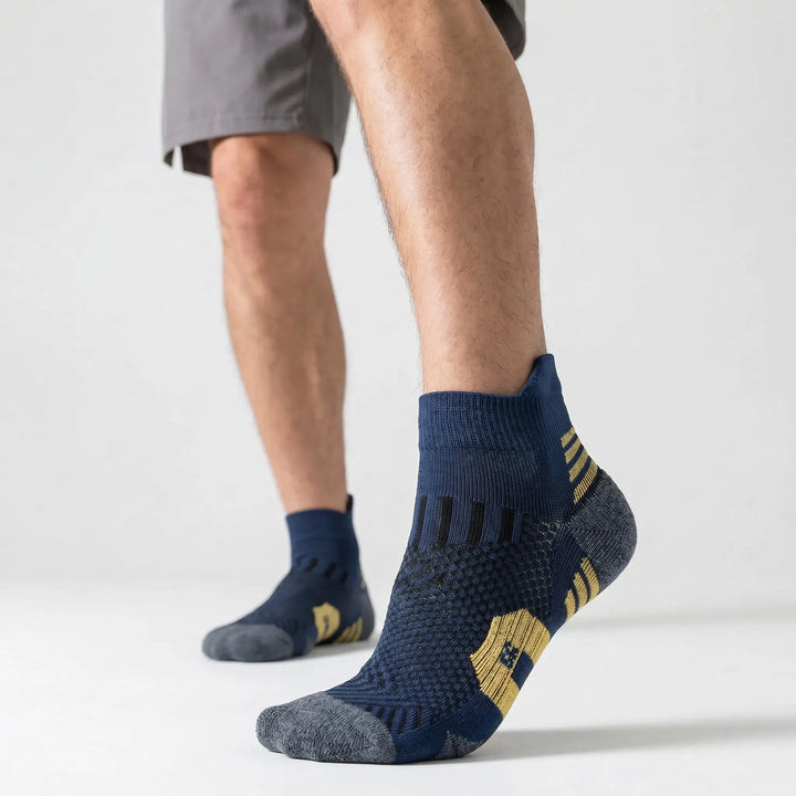 Short ankle sports socks designed for athletes. Unisex training socks with cushioned comfort & non-slip grip for performance.