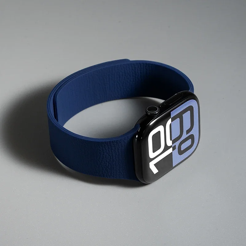 Secure magnetic closure on a unisex silicone smartwatch wristband, easy to adjust.