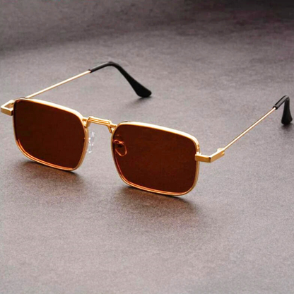Statement rectangular shades with a sleek metal frame, offering a bold and stylish accessory for any outfit.