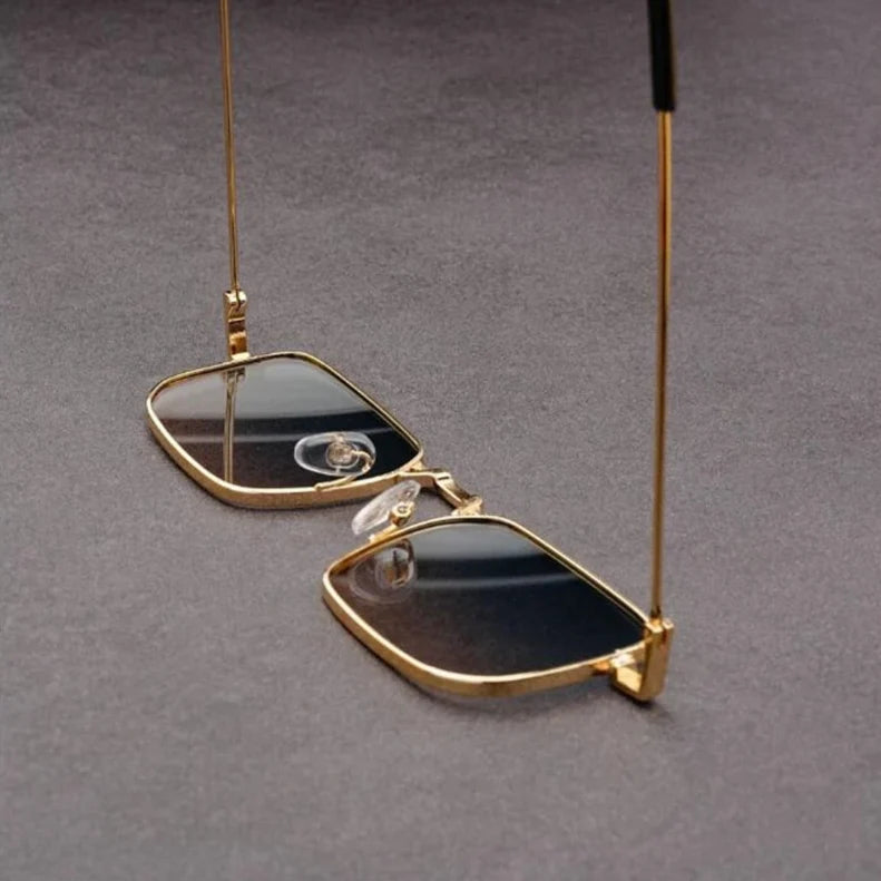 Sleek rectangular sunglasses with a bold metal frame, delivering a contemporary and stylish eyewear statement.