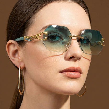 Stylish unisex rimless sunglasses, polygonal shape, perfect for eye protection and fashion.