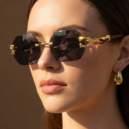 Fashionable leopard print rimless sunglasses, UV400 eye protection for all.