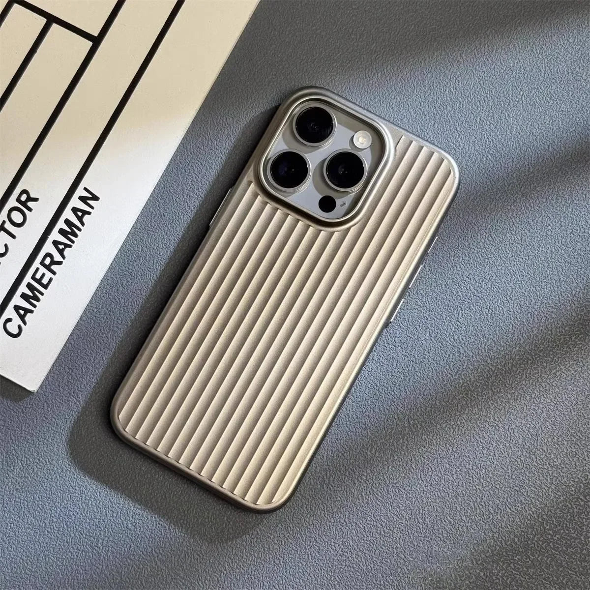 Versatile unisex titanium iPhone case. Slim, shockproof, & supports wireless charging. A smart choice.