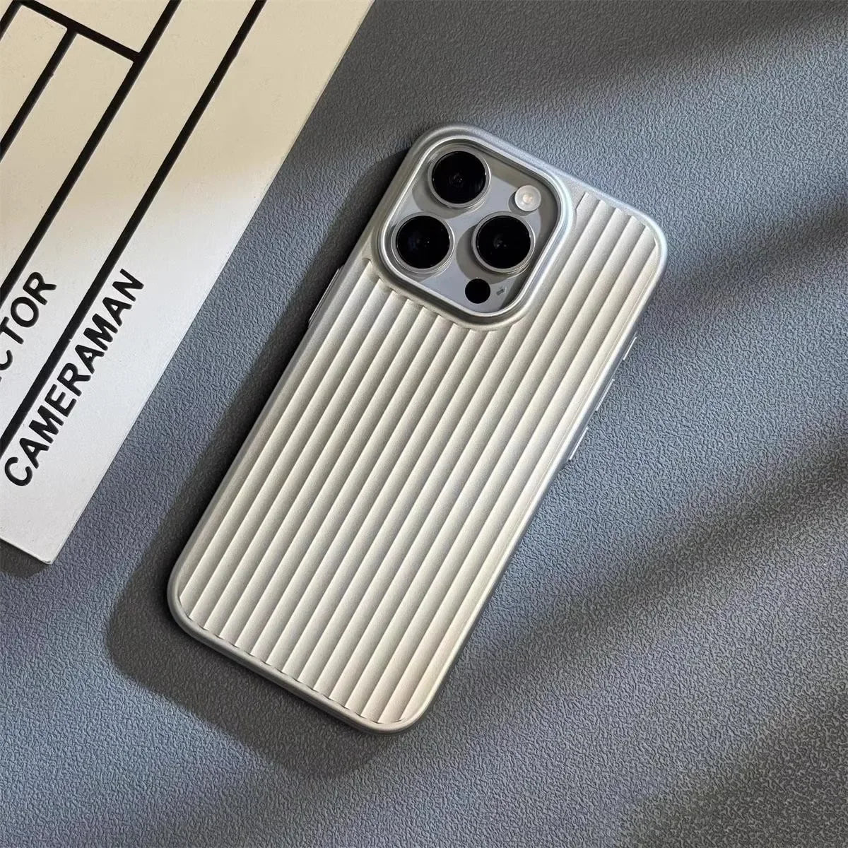 Premium titanium iPhone case. Ultra-slim profile, shockproof protection, and wireless charging compatible.