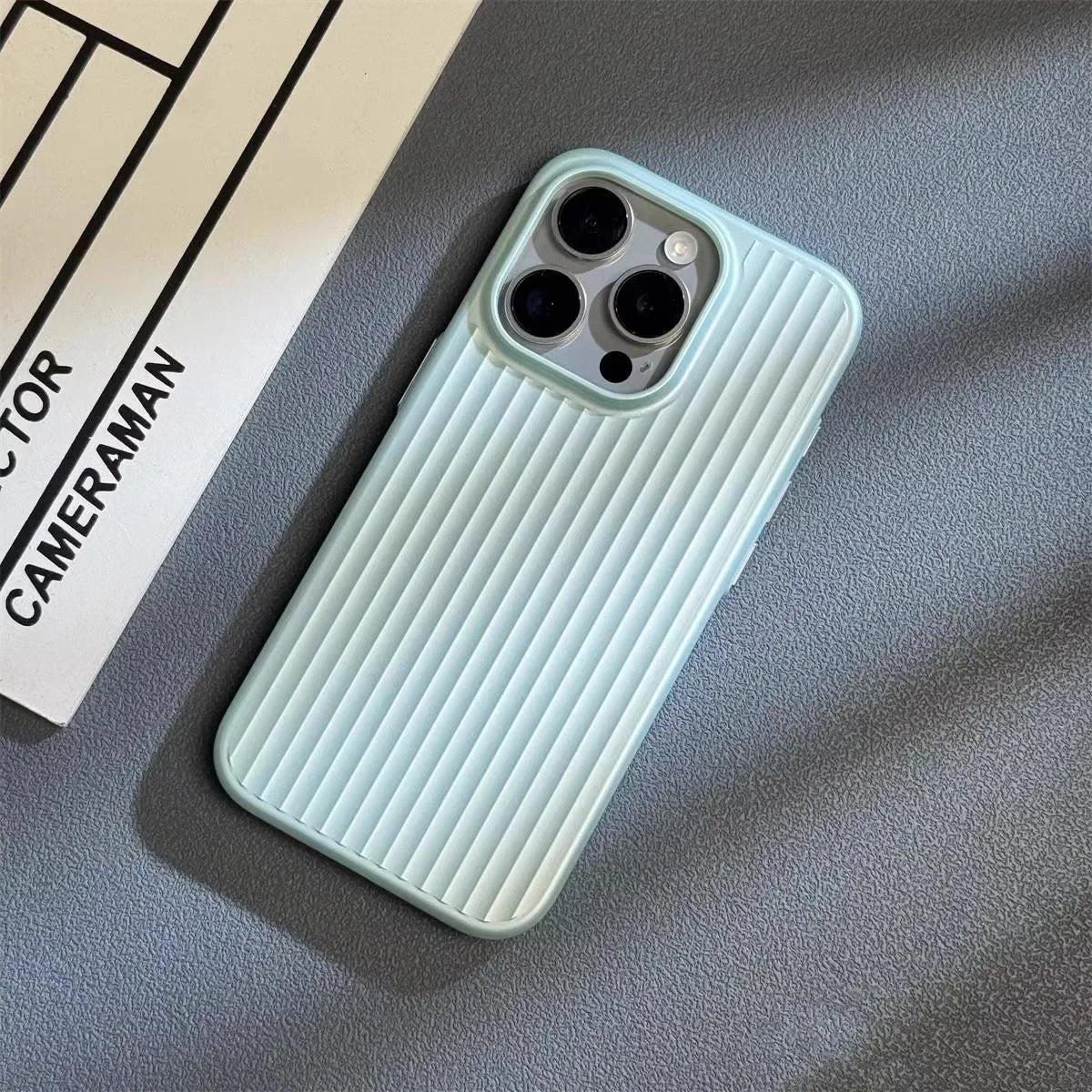 Dustproof & protective slim titanium iPhone case. Lightweight accessory for enhanced phone safety.