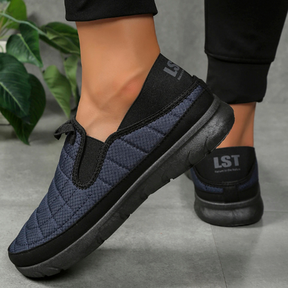 Comfortable slip-on walking shoes with a quilted, water-resistant, and breathable design.