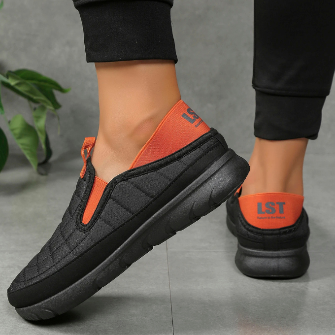 Quilted water-resistant slip-on walking shoes, lightweight and breathable for active comfort.