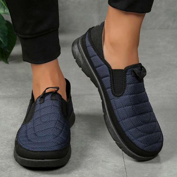 Unisex quilted slip-on walking shoes, offering lightweight comfort and breathable design.