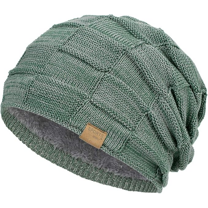 Fashionable unisex slouchy beanie, a versatile knitted hat offering warmth for any winter outfit.