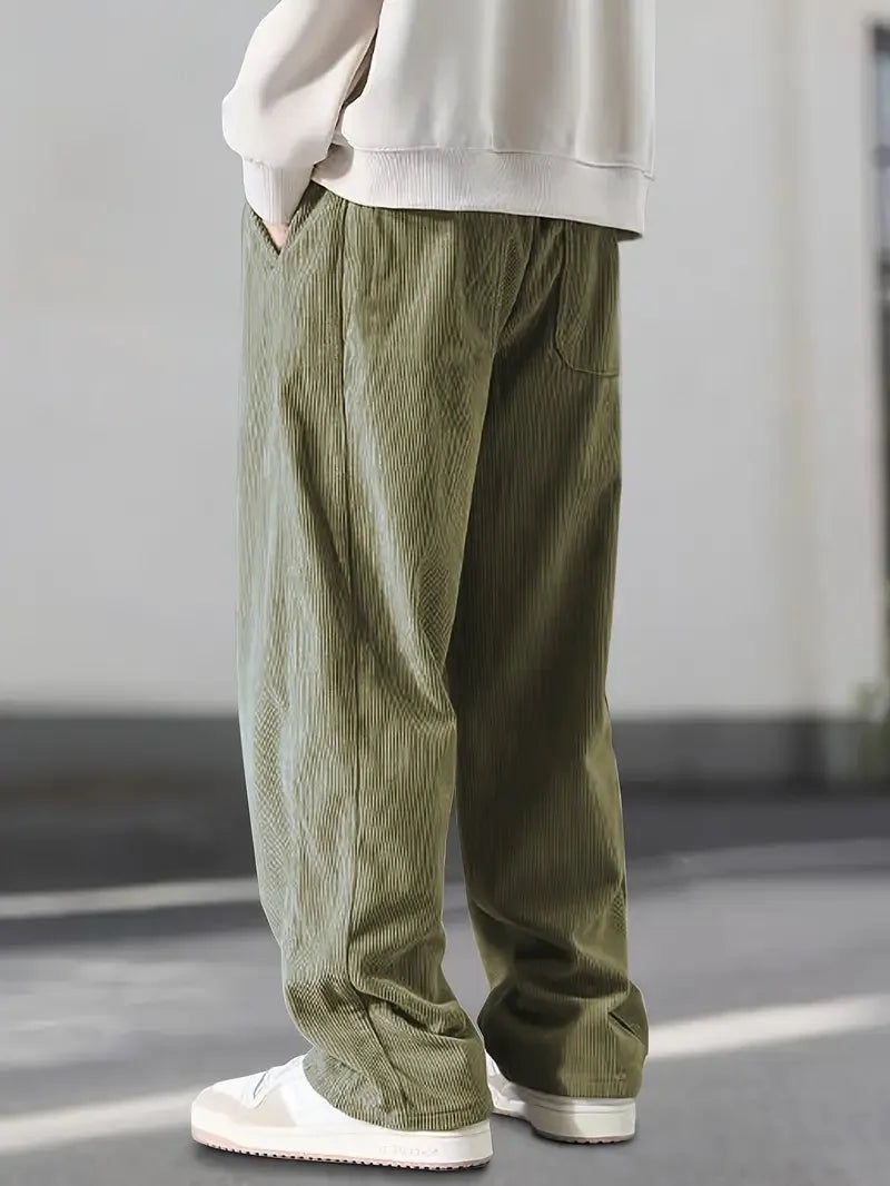 Side view of comfy unisex wide leg corduroy pants, perfect for relaxed casual style.