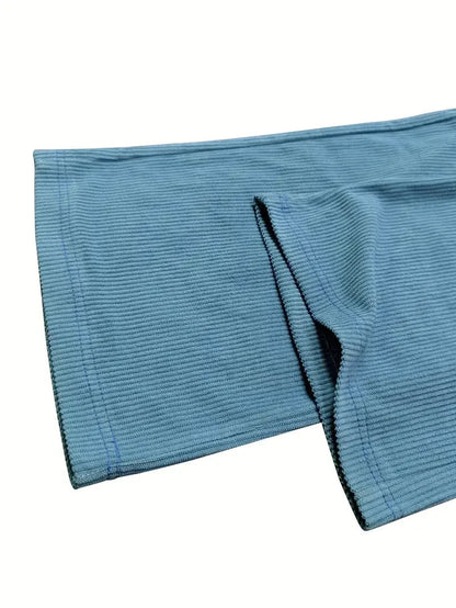 Soft corduroy wide leg pants: relaxed fit, drawstring, unisex design for ultimate comfort.